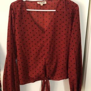 Boutique top with bell sleeves